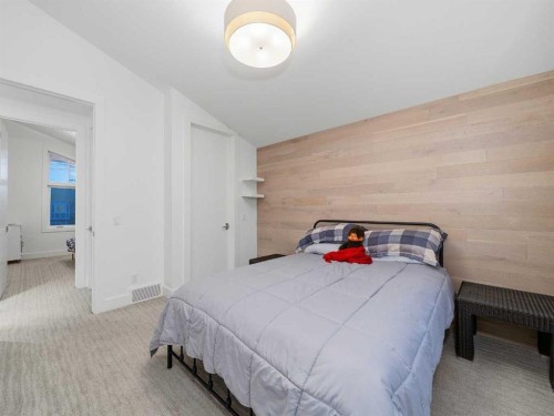 80 Cranbrook Heights Se, Calgary, AB - Indoor Photo Showing Bedroom