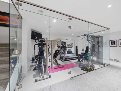 80 Cranbrook Heights Se, Calgary, AB - Indoor Photo Showing Gym Room