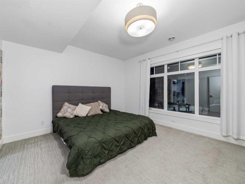 80 Cranbrook Heights Se, Calgary, AB - Indoor Photo Showing Bedroom