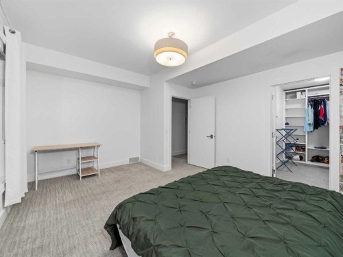 80 Cranbrook Heights Se, Calgary, AB - Indoor Photo Showing Bedroom