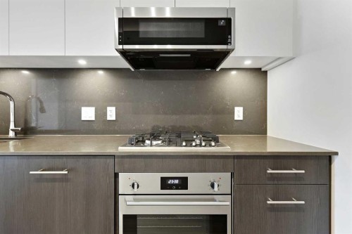 1103-730 2 Avenue Sw, Calgary, AB - Indoor Photo Showing Kitchen With Upgraded Kitchen