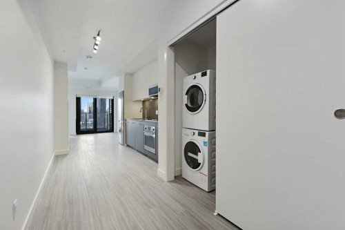 1103-730 2 Avenue Sw, Calgary, AB - Indoor Photo Showing Laundry Room