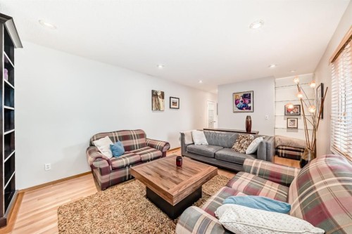 3707 37 Street Nw, Calgary, AB - Indoor Photo Showing Living Room With Fireplace