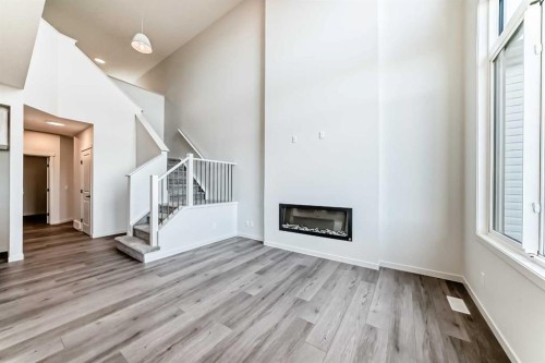 67 Bartlett Crescent Se, Calgary, AB - Indoor With Fireplace