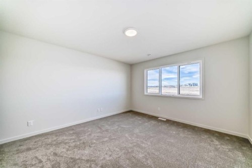 67 Bartlett Crescent Se, Calgary, AB - Indoor Photo Showing Other Room