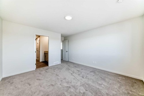 67 Bartlett Crescent Se, Calgary, AB - Indoor Photo Showing Other Room
