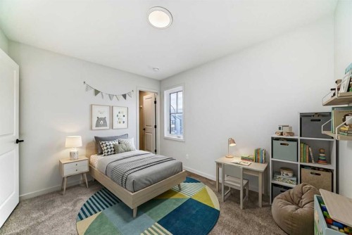 67 Bartlett Crescent Se, Calgary, AB - Indoor Photo Showing Bedroom