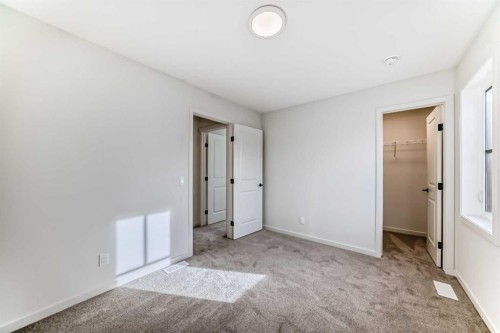 67 Bartlett Crescent Se, Calgary, AB - Indoor Photo Showing Other Room