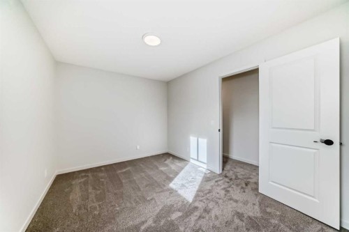 67 Bartlett Crescent Se, Calgary, AB - Indoor Photo Showing Other Room