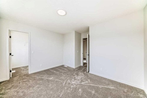 67 Bartlett Crescent Se, Calgary, AB - Indoor Photo Showing Other Room
