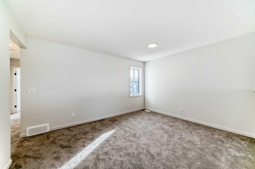 67 Bartlett Crescent Se, Calgary, AB - Indoor Photo Showing Other Room