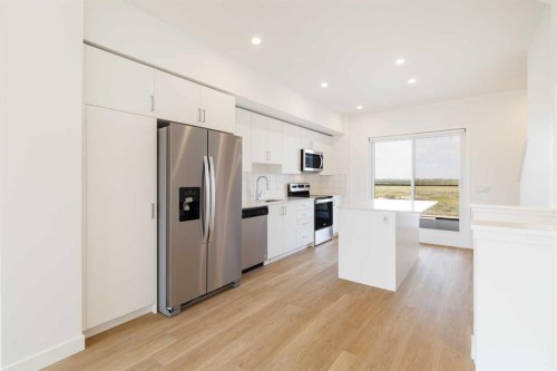 409-8535 19 Avenue Se, Calgary, AB - Indoor Photo Showing Kitchen