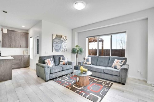 155 Savanna Way Ne, Calgary, AB - Indoor Photo Showing Living Room