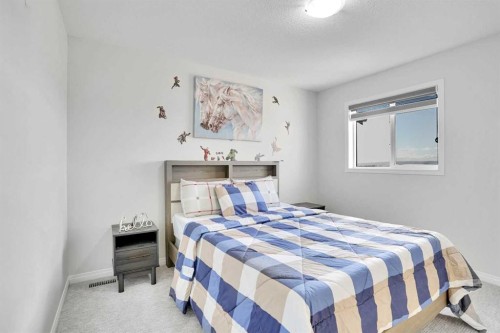 155 Savanna Way Ne, Calgary, AB - Indoor Photo Showing Bedroom