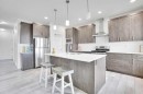 155 Savanna Way Ne, Calgary, AB  - Indoor Photo Showing Kitchen With Stainless Steel Kitchen With Upgraded Kitchen 