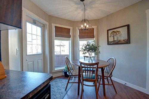 1606-2445 Kingsland Road Se, Airdrie, AB - Indoor Photo Showing Dining Room