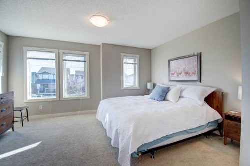1606-2445 Kingsland Road Se, Airdrie, AB - Indoor Photo Showing Bedroom