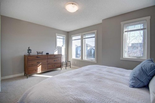 1606-2445 Kingsland Road Se, Airdrie, AB - Indoor Photo Showing Bedroom