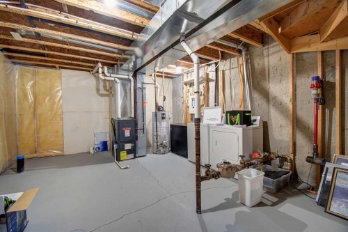 1606-2445 Kingsland Road Se, Airdrie, AB - Indoor Photo Showing Basement