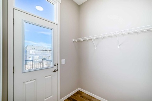 77 Mercado Landing Se, Calgary, AB - Indoor Photo Showing Other Room