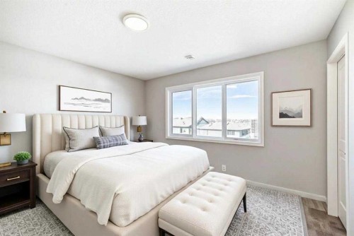 77 Mercado Landing Se, Calgary, AB - Indoor Photo Showing Bedroom