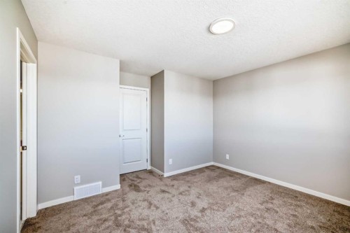 77 Mercado Landing Se, Calgary, AB - Indoor Photo Showing Other Room