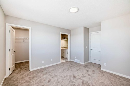 77 Mercado Landing Se, Calgary, AB - Indoor Photo Showing Other Room