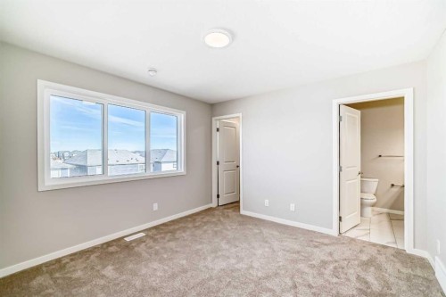 77 Mercado Landing Se, Calgary, AB - Indoor Photo Showing Other Room