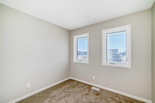 77 Mercado Landing Se, Calgary, AB - Indoor Photo Showing Other Room