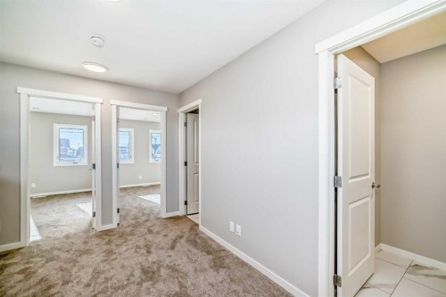 77 Mercado Landing Se, Calgary, AB - Indoor Photo Showing Other Room