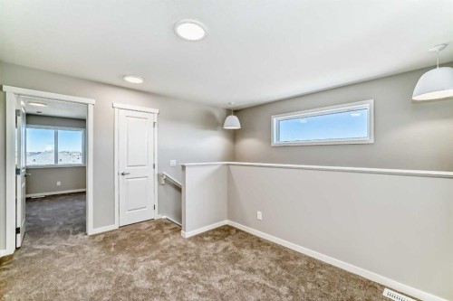 77 Mercado Landing Se, Calgary, AB - Indoor Photo Showing Other Room