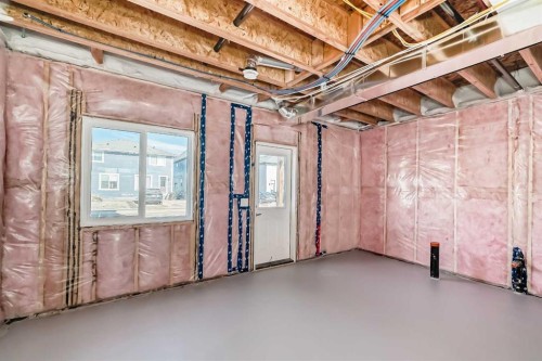 77 Mercado Landing Se, Calgary, AB - Indoor Photo Showing Basement