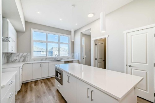 77 Mercado Landing Se, Calgary, AB - Indoor Photo Showing Kitchen