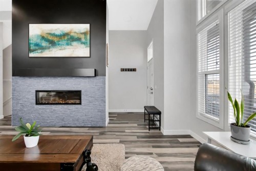 273 Masters Road Se, Calgary, AB - Indoor Photo Showing Other Room With Fireplace