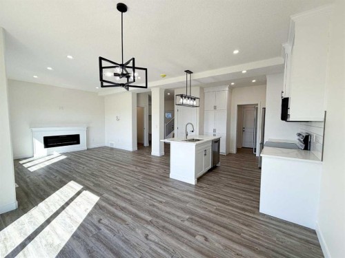 1207 Westview Drive, Bowden, AB - Indoor With Fireplace