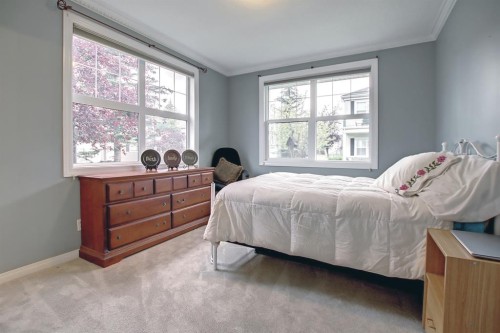 92 Prestwick Gardens Se, Calgary, AB - Indoor Photo Showing Bedroom