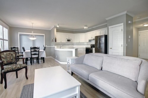 92 Prestwick Gardens Se, Calgary, AB - Indoor Photo Showing Living Room