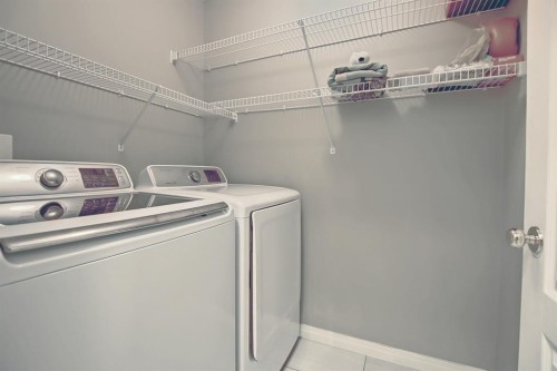 92 Prestwick Gardens Se, Calgary, AB - Indoor Photo Showing Laundry Room
