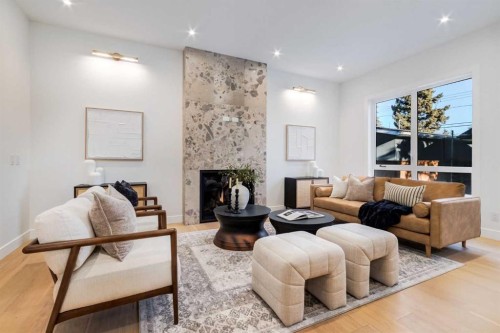 8812 33 Avenue Nw, Calgary, AB - Indoor Photo Showing Living Room With Fireplace