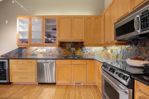 702 Patterson View Sw, Calgary, AB - Indoor Photo Showing Kitchen With Double Sink