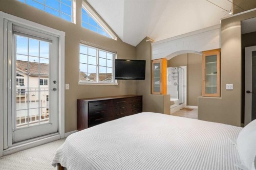 702 Patterson View Sw, Calgary, AB - Indoor Photo Showing Bedroom