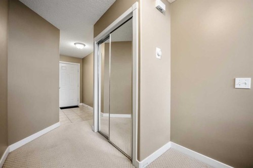 702 Patterson View Sw, Calgary, AB - Indoor Photo Showing Other Room