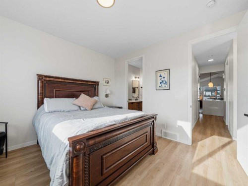 111 Haskayne Drive Nw, Calgary, AB - Indoor Photo Showing Bedroom
