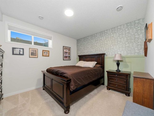 111 Haskayne Drive Nw, Calgary, AB - Indoor Photo Showing Bedroom