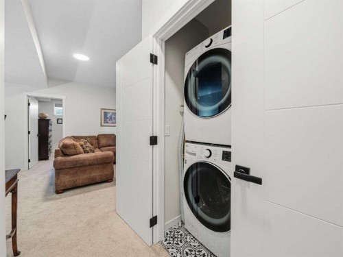 111 Haskayne Drive Nw, Calgary, AB - Indoor Photo Showing Laundry Room