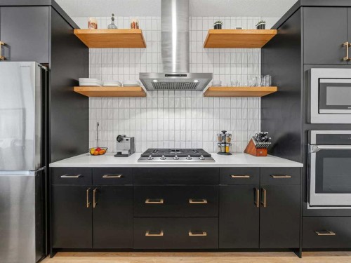 111 Haskayne Drive Nw, Calgary, AB - Indoor Photo Showing Kitchen With Upgraded Kitchen