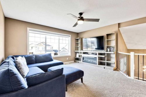 205 Aspenmere Way, Chestermere, AB - Indoor Photo Showing Living Room
