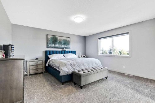 205 Aspenmere Way, Chestermere, AB - Indoor Photo Showing Bedroom