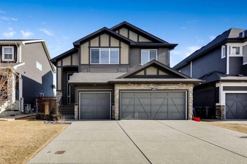 205 Aspenmere Way, Chestermere, AB - Outdoor With Facade