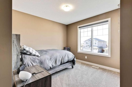 205 Aspenmere Way, Chestermere, AB - Indoor Photo Showing Bedroom